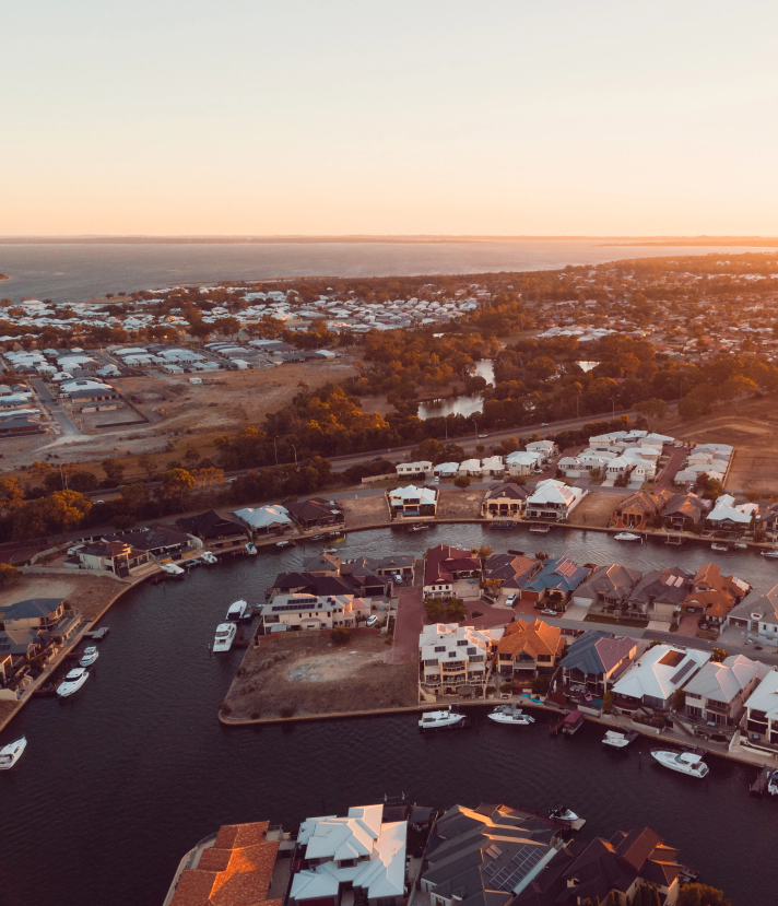 Aerial sunset view of coastal housing estate